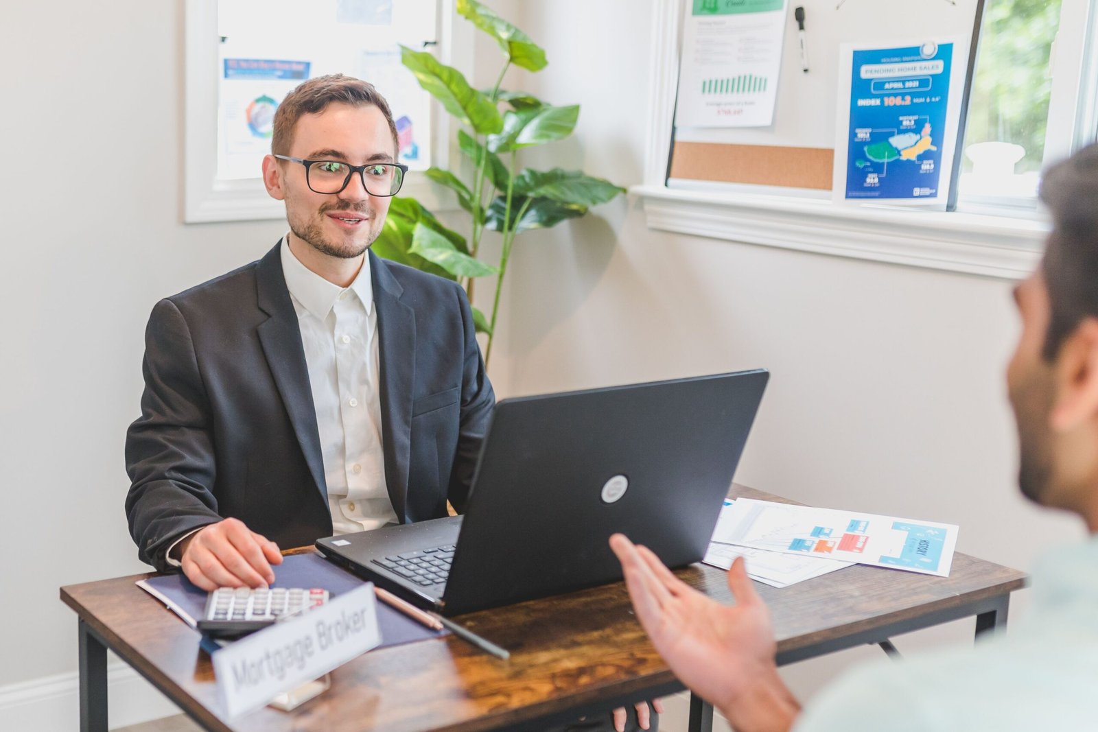 Discussing a bad credit mortgage application with a broker