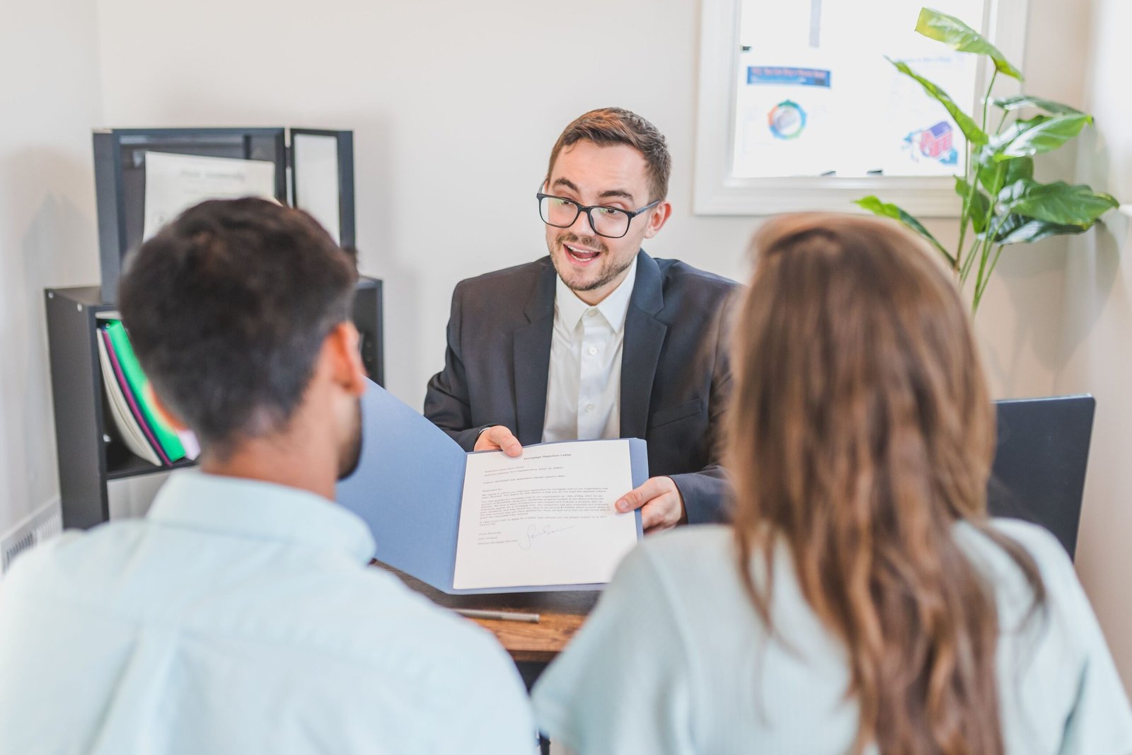 Reviewing a home equity loan agreement with a broker