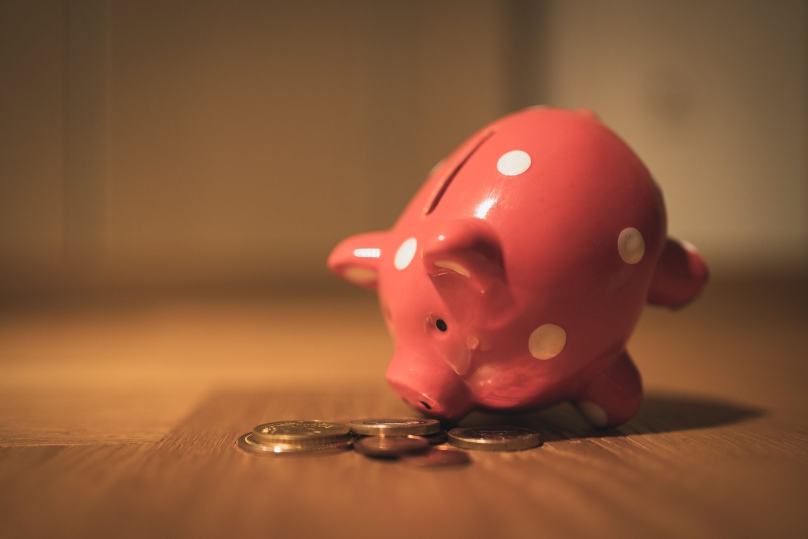 Separate savings jars representing sinking funds and emergency savings