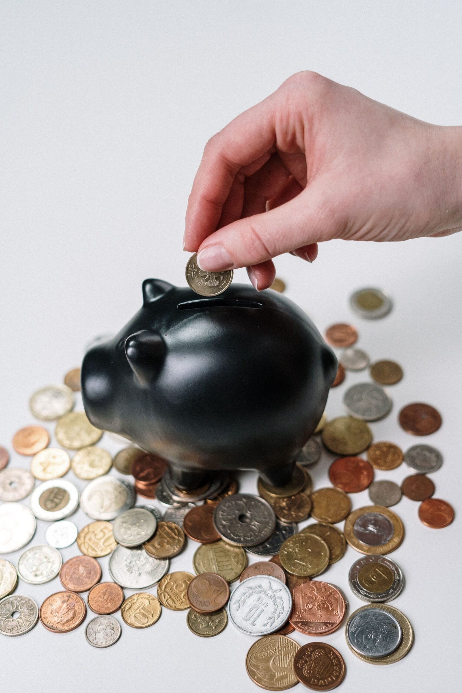 Saving money in a piggy bank for short-term financial goals
