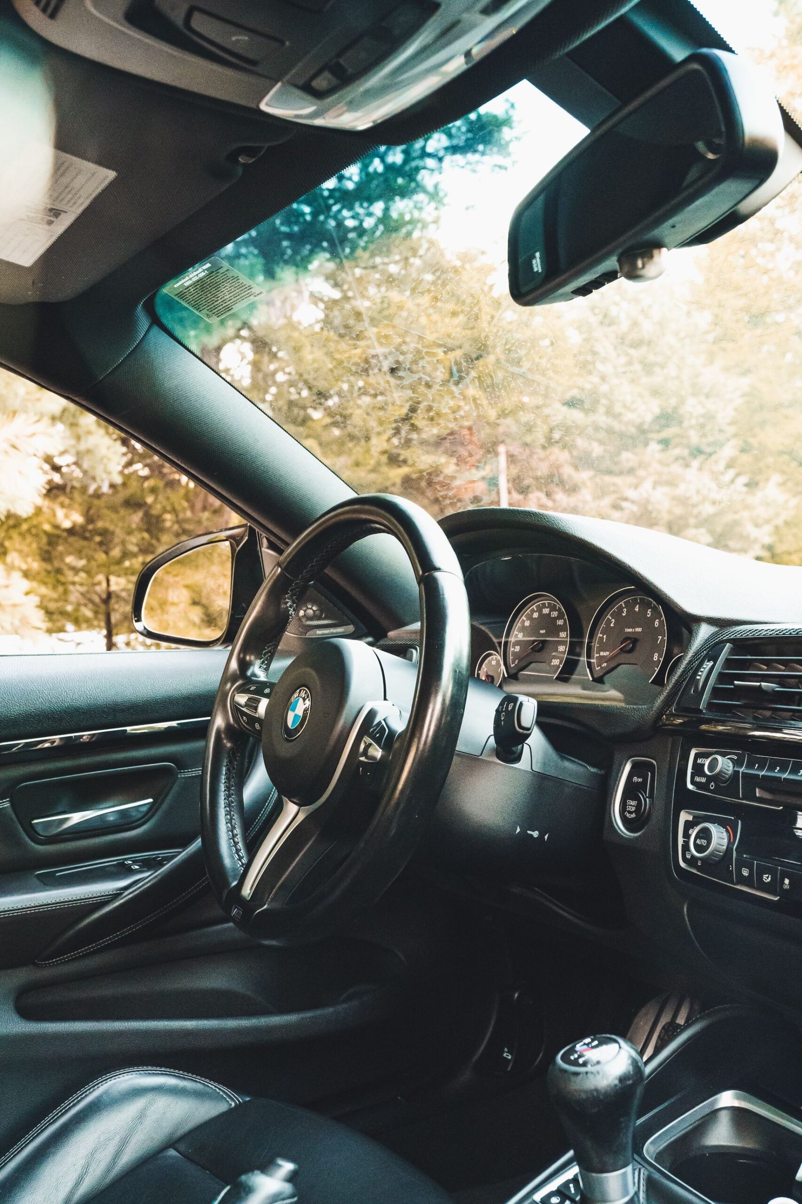 UK driver at the wheel comparing car insurance costs