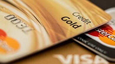 Stack of credit cards showing how credit card interest is calculated on balances