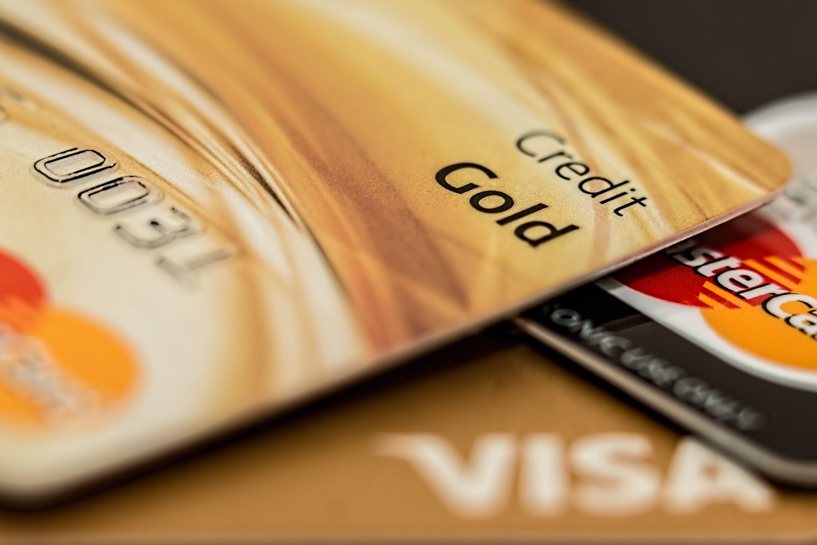 Stack of credit cards showing how credit card interest is calculated on balances