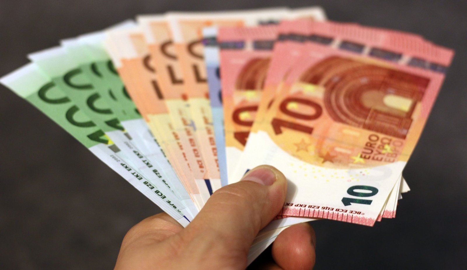 Euro banknotes withdrawn using a credit card at an ATM abroad