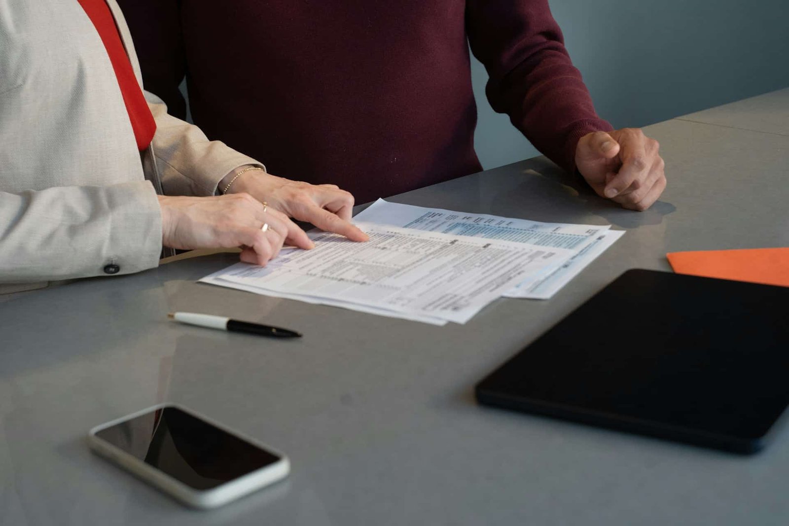 Reviewing travel insurance policy terms before agreeing to an exclusion